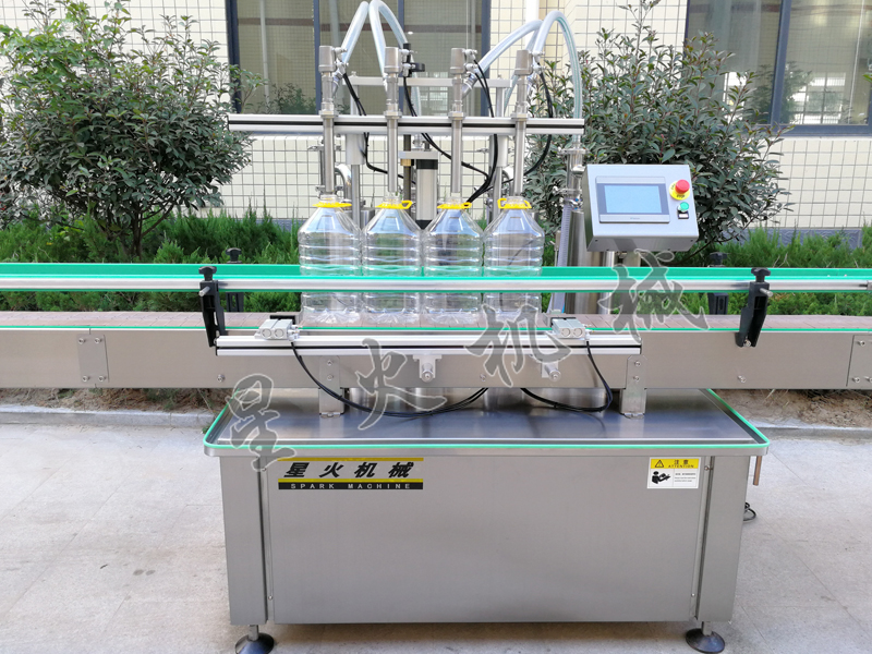 新型四頭食用油自動稱重灌裝旋蓋機-2.jpg